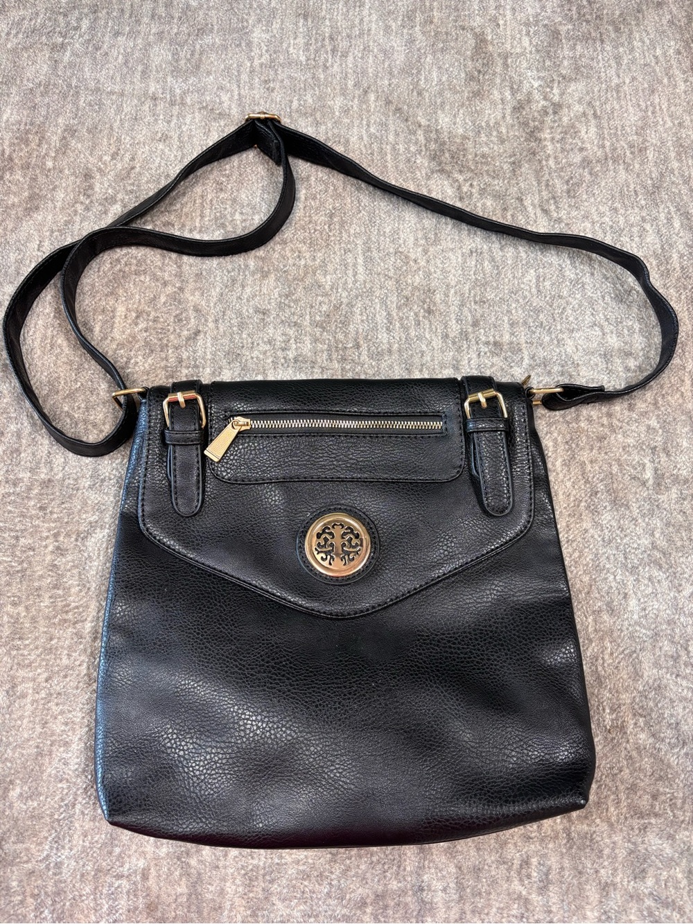 Black Leather Crossbody Bag with Gold Medallion Accent